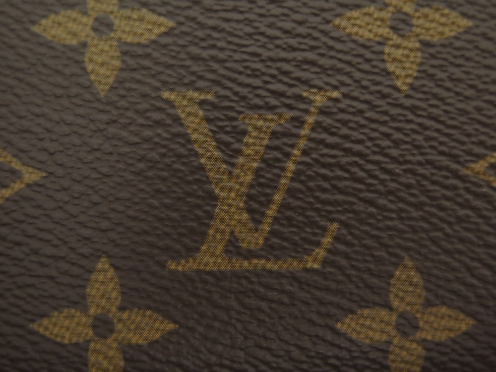 Portefeuille clemence en toile Louis Vuitton Brown in Cloth - 35368108